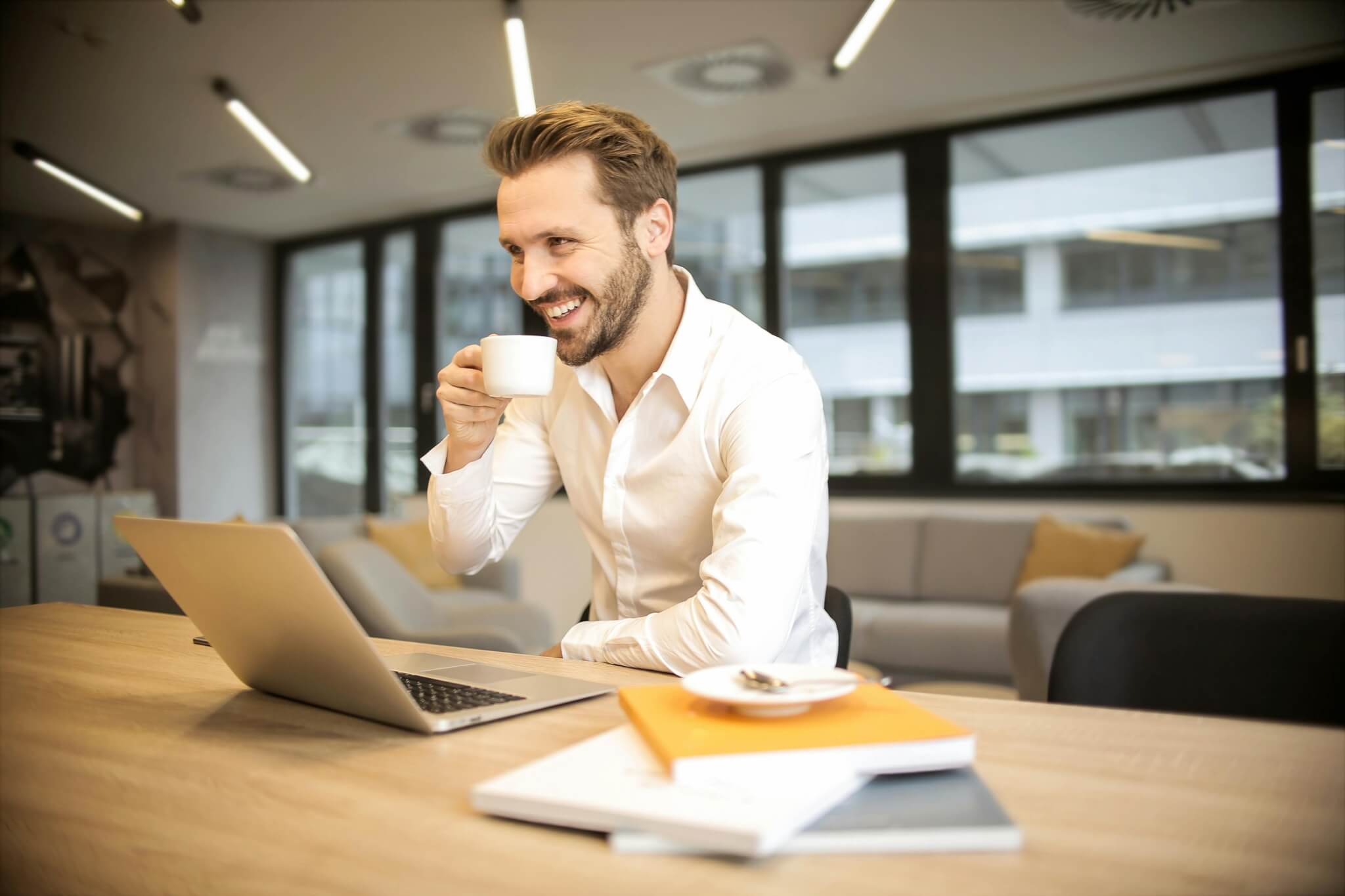 Man using laptop to get started as a contractor