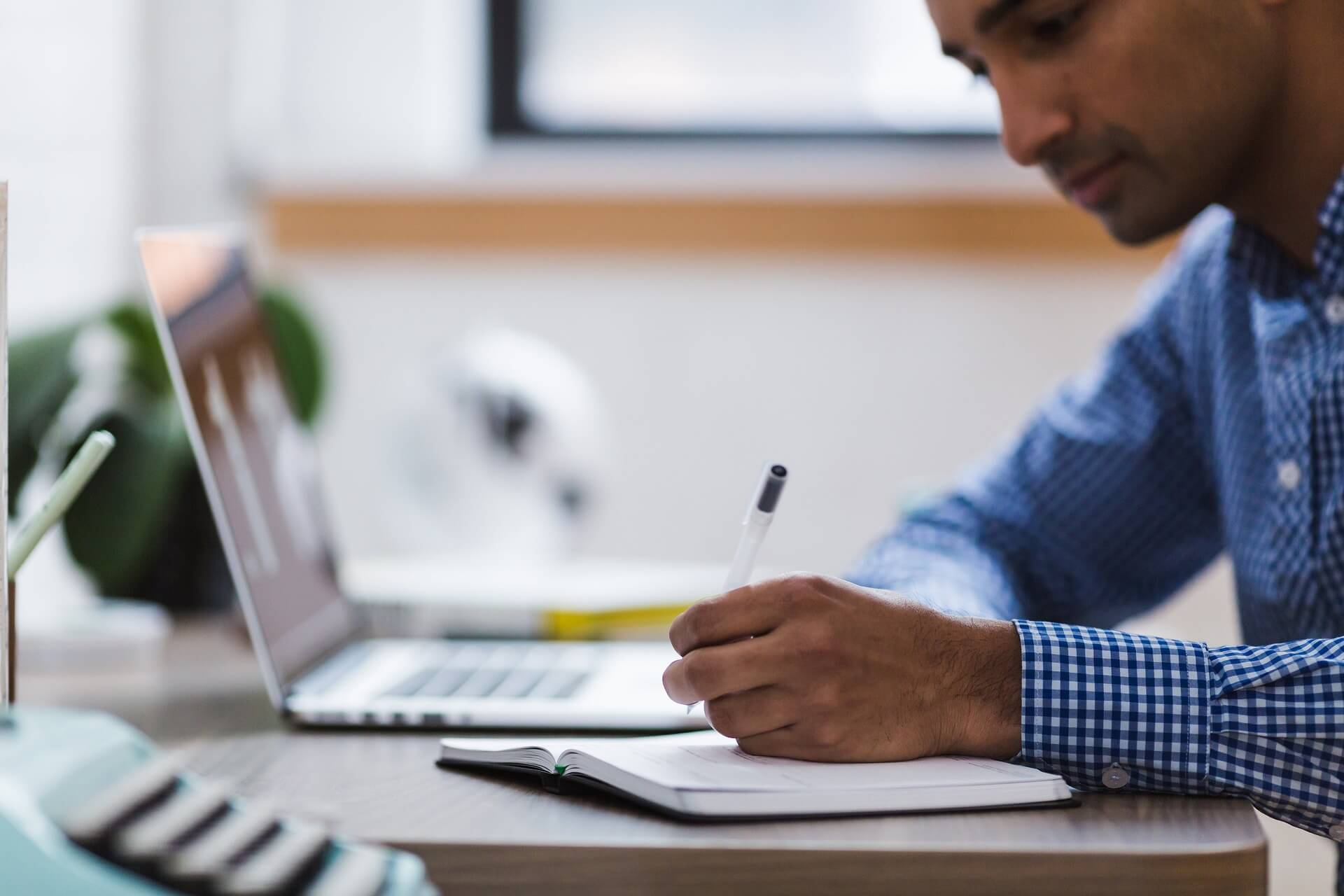 Limited company director working at a desk