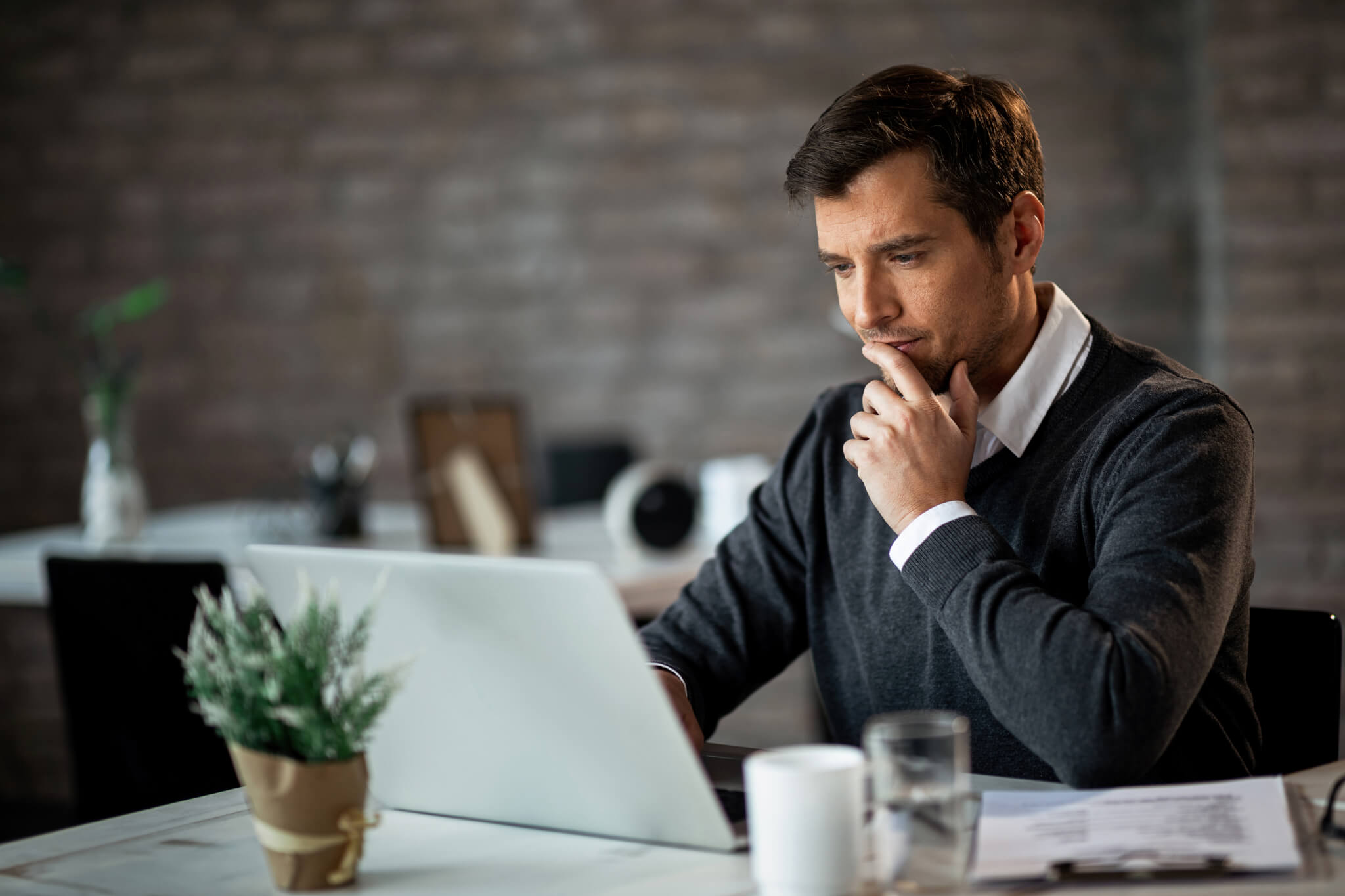 Contractor looking at IR35 legislation on laptop