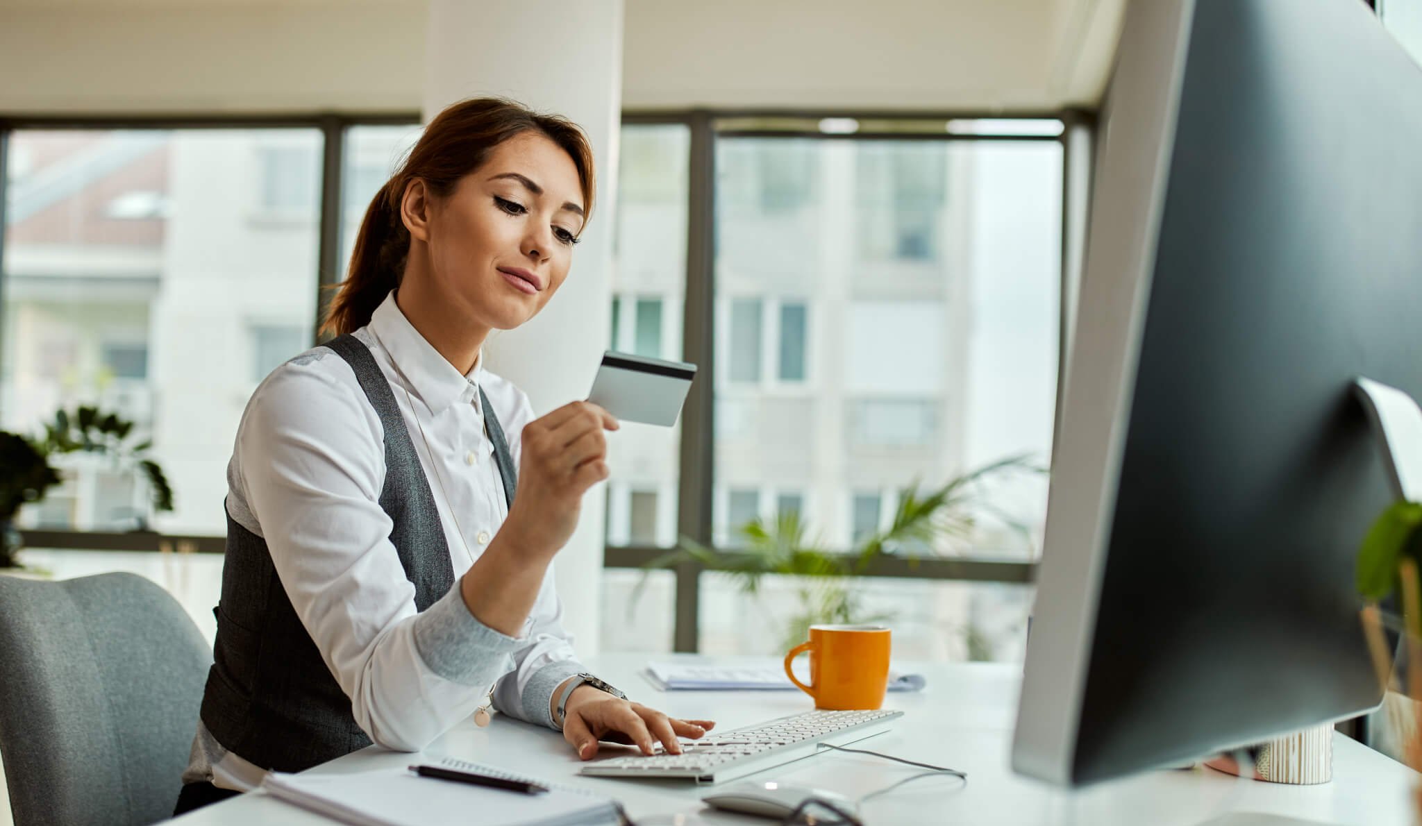 Business owner setting up credit card for her business bank account