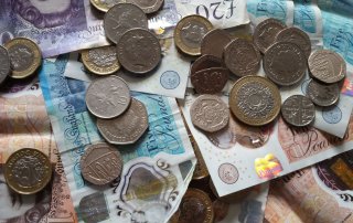 Director reviewing their Director’s Loan Account and company records, assessing loan withdrawals, repayments, and HMRC tax implications.